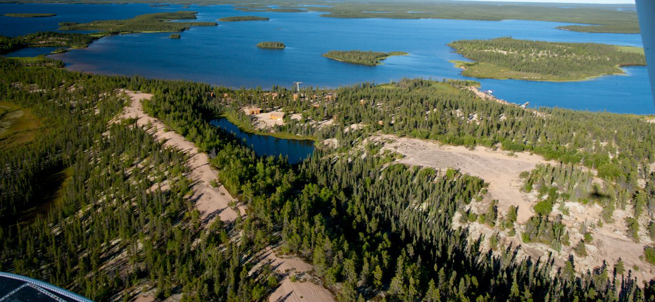 Floatplane travels over esker